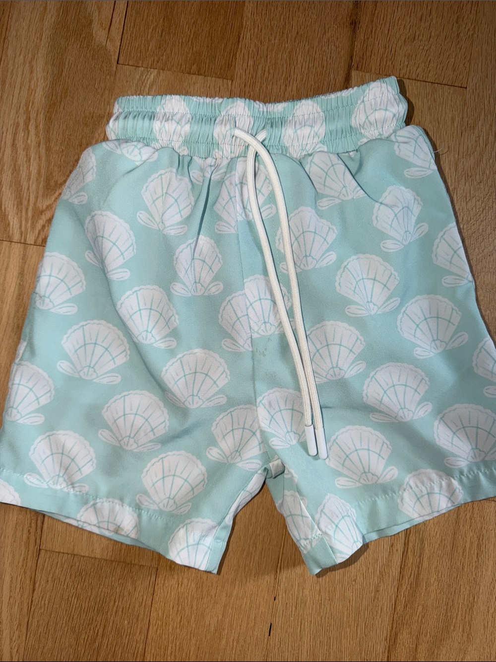 Kids Mint Shell Print Swim Trunks